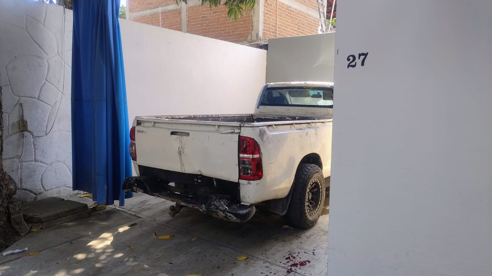 Encuentran a hombre degollado en motel de Las Guacamayas